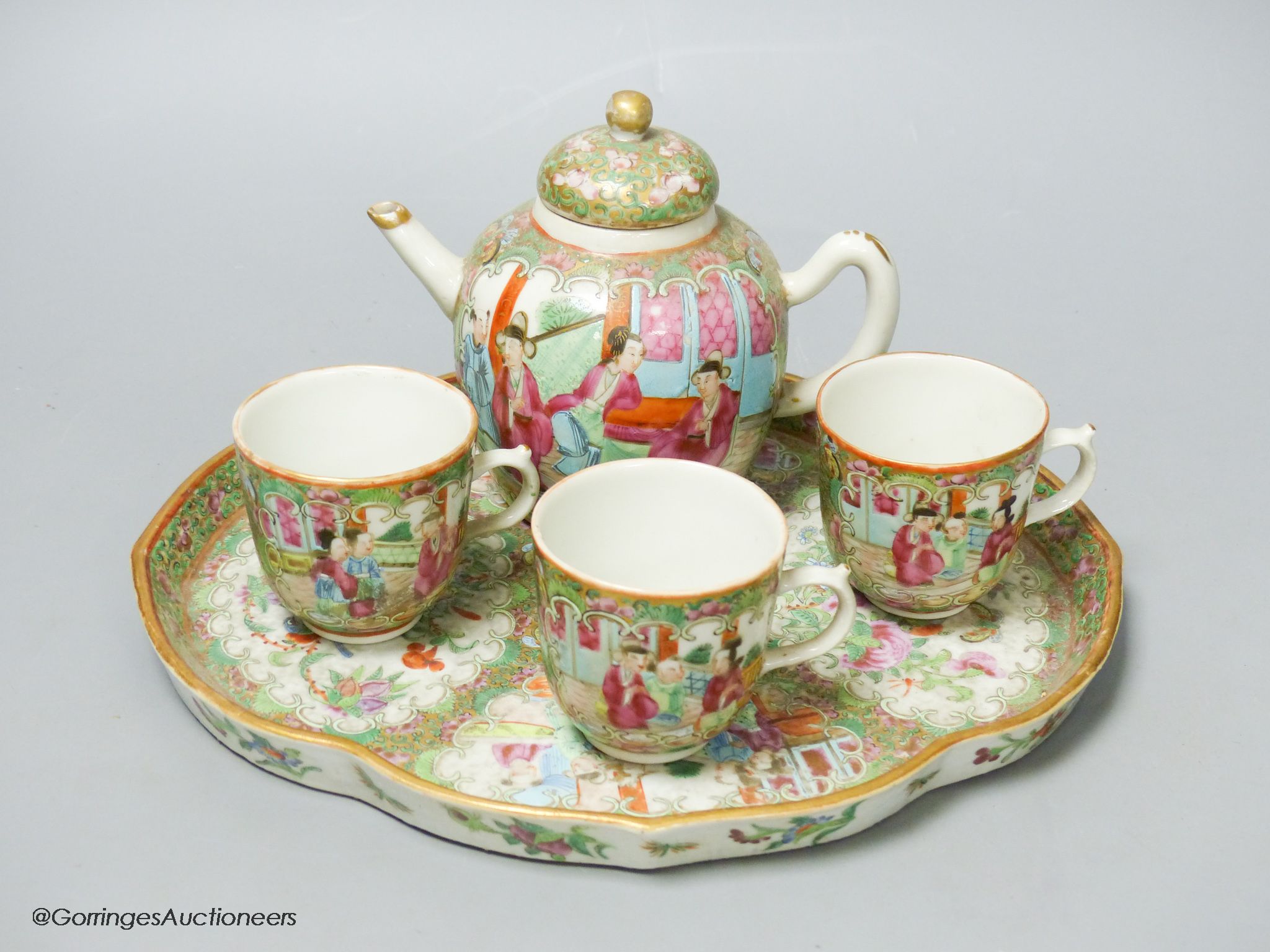 A 19th century Chinese famille rose five piece porcelain tea set